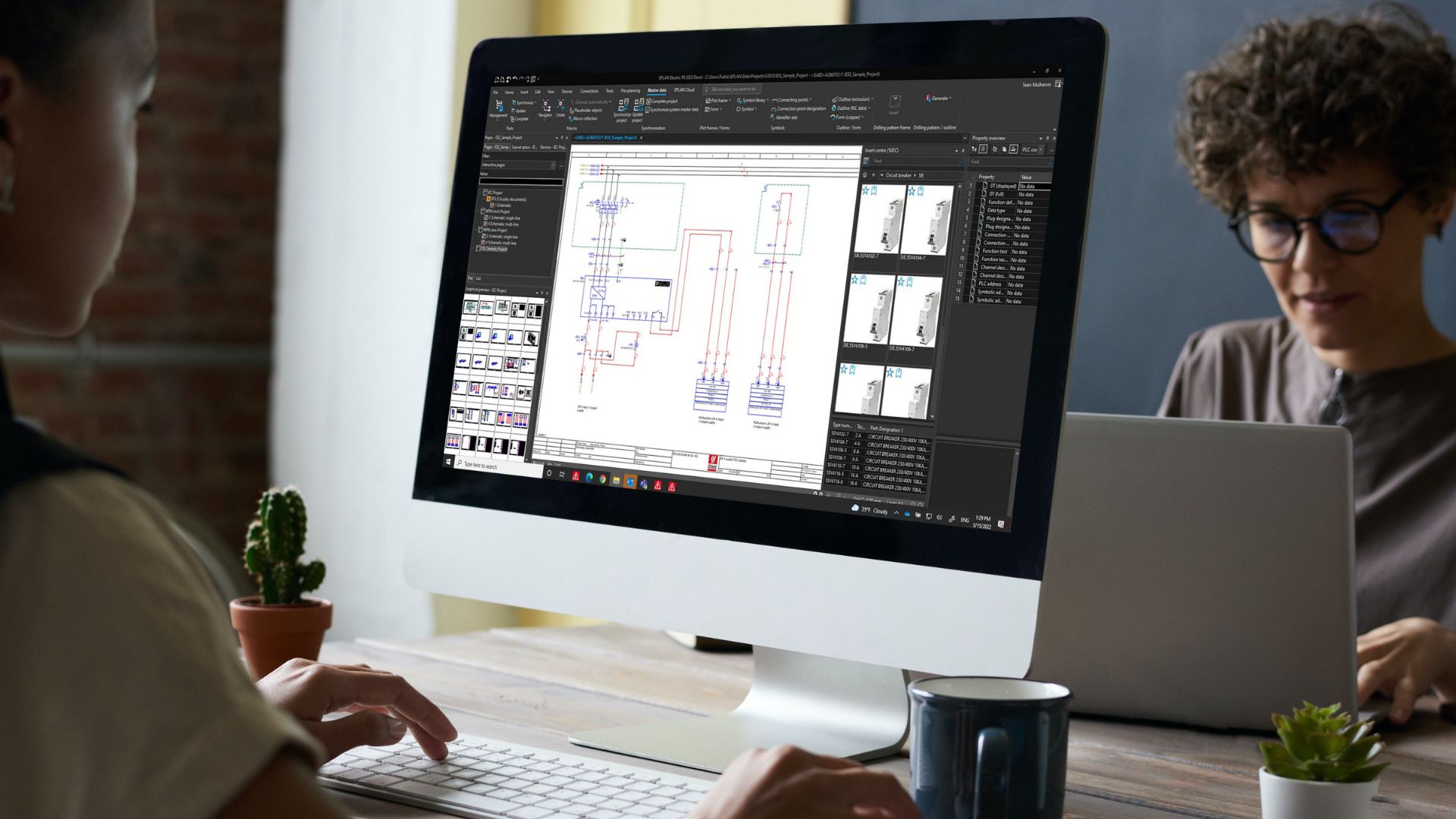 An image of electrical engineers using dedicated electrical CAD software